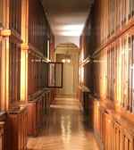 empty hallway with wood panels